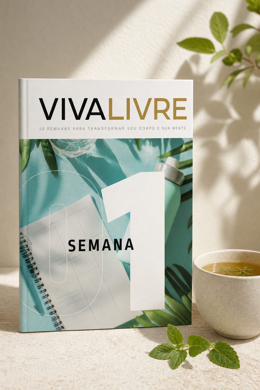 Fascículo da Semana 1 do Viva Livre sobre uma mesa clara, com plantas